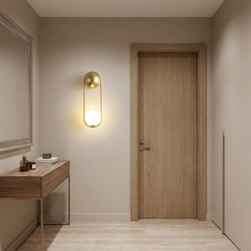Sleek Brass Wall Sconce with Glass Shade