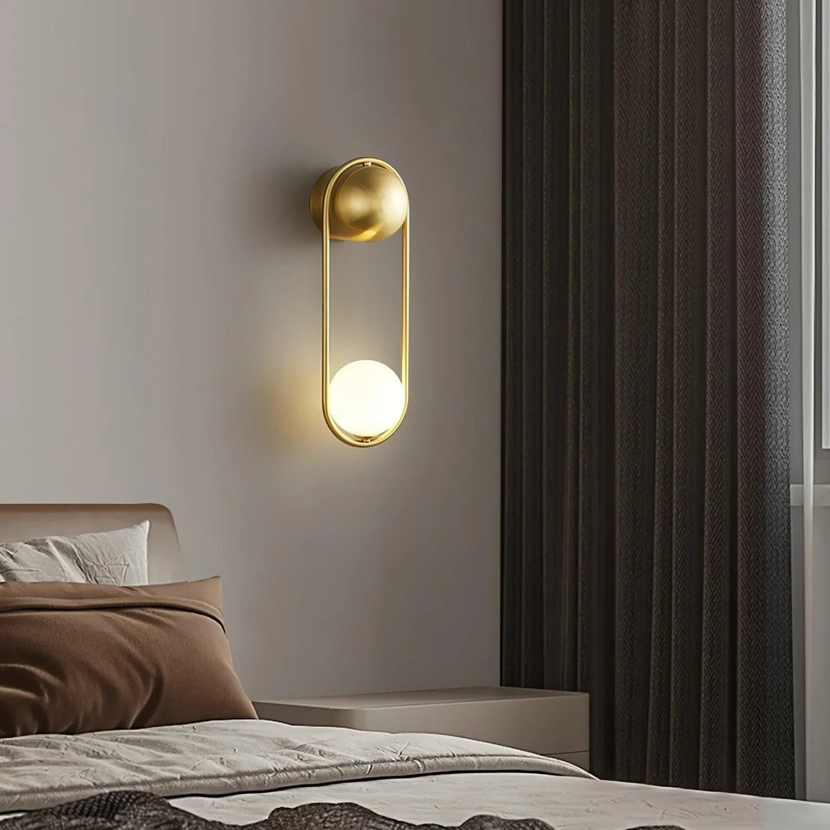 Sleek Brass Wall Sconce with Glass Shade