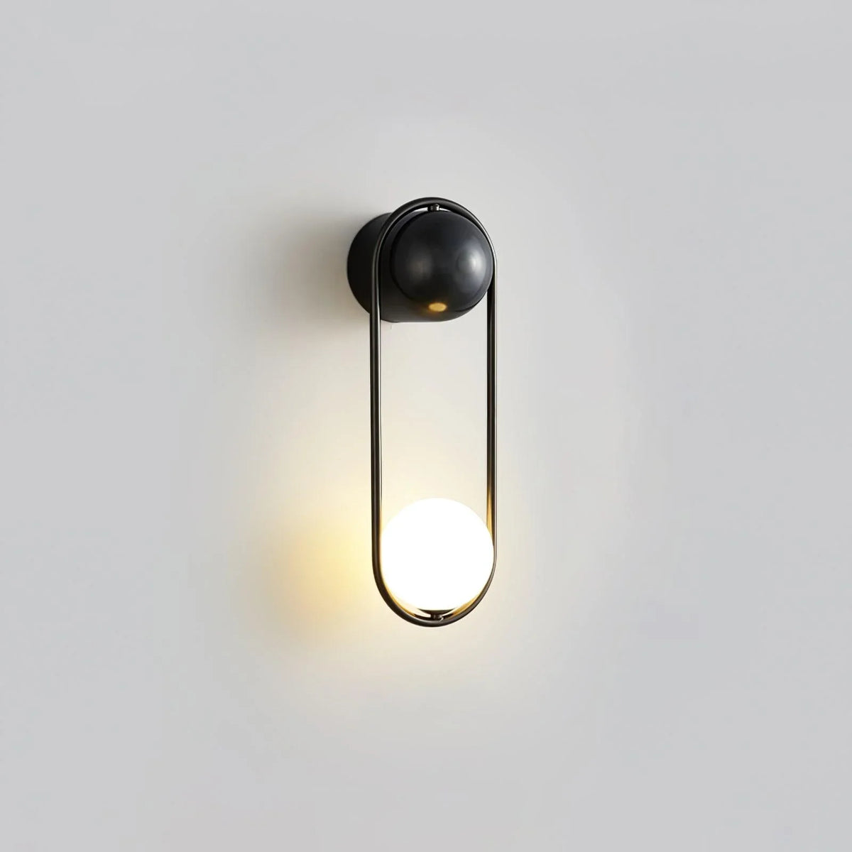 Sleek Brass Wall Sconce with Glass Shade