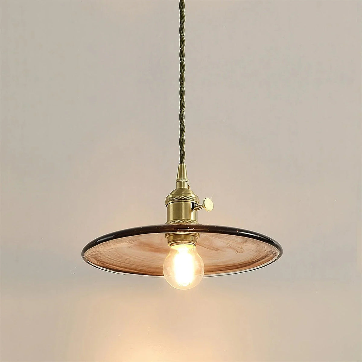Sleek Mid Century Glass Pendant Light with Brass Shade