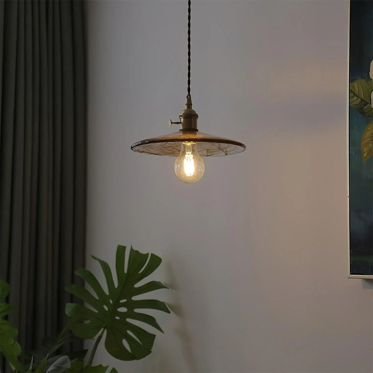 Sleek Mid Century Glass Pendant Light with Brass Shade