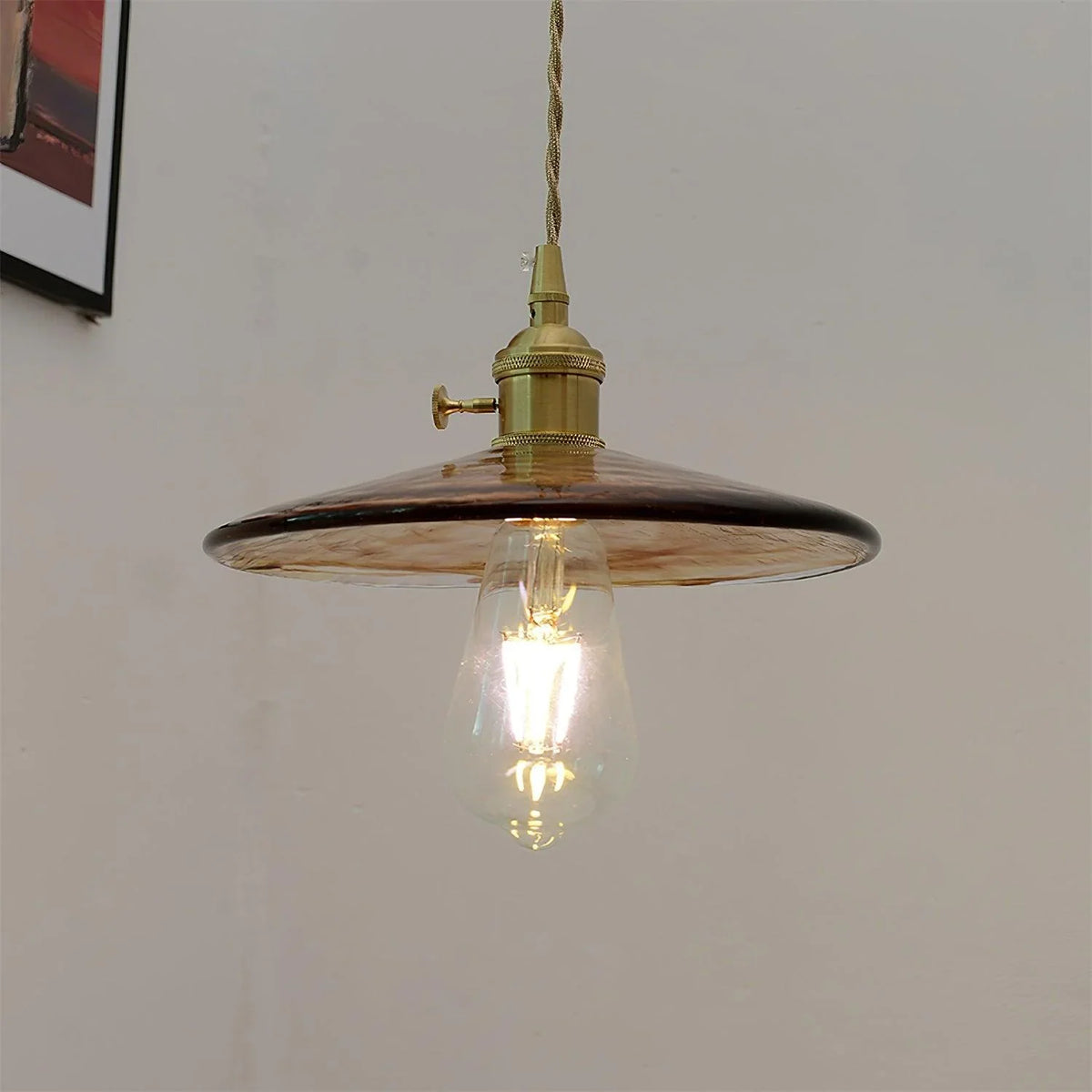 Sleek Mid Century Glass Pendant Light with Brass Shade